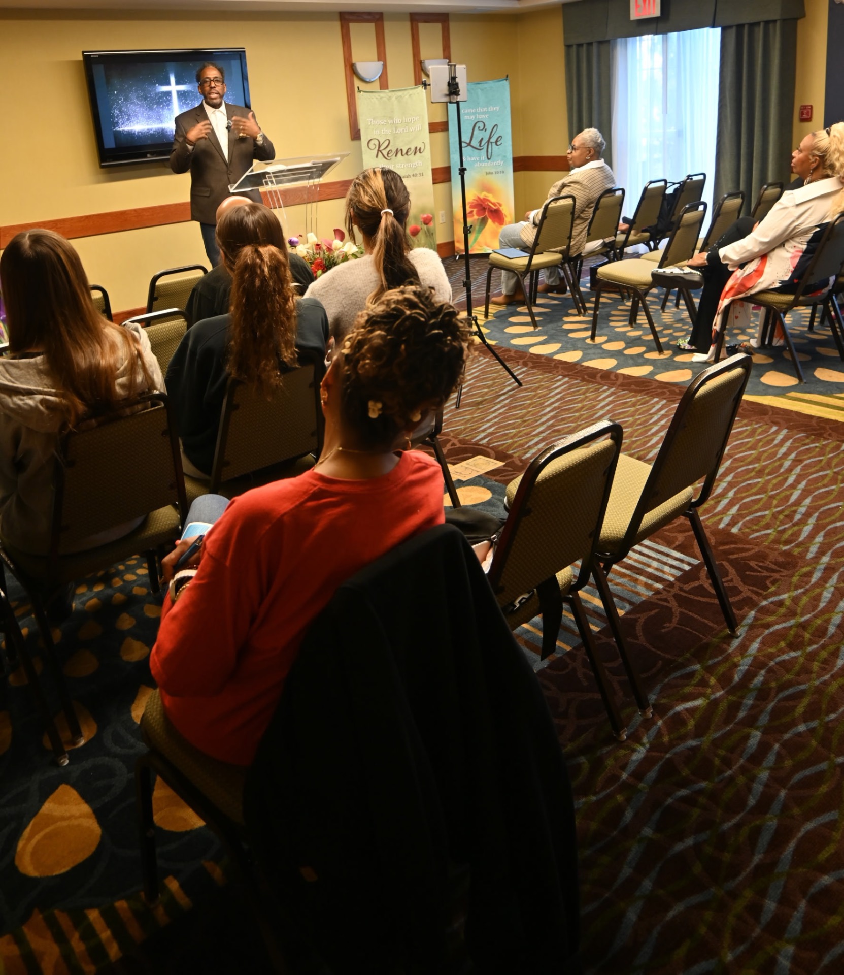 Pastor Glenn Bond with members of the women's ministry at His Grace Is Sufficient